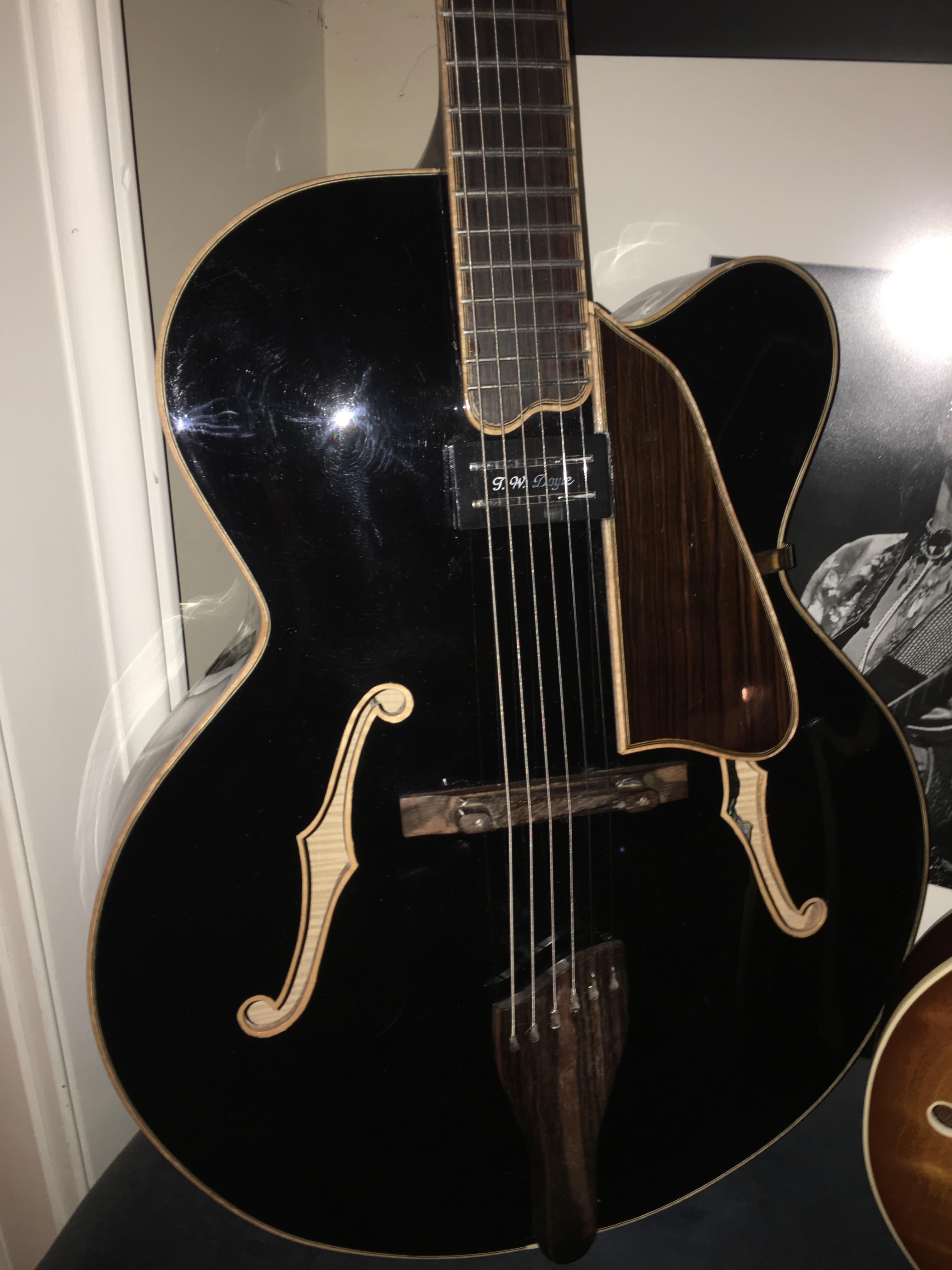 Black Archtop with Maple Binding